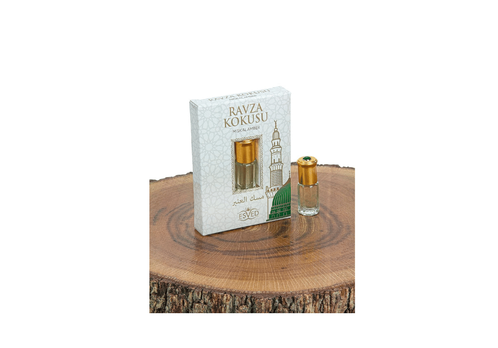 Arabisches Duftöl als Parfum Set für Damen und Herren auf einem Holzstück präsentiert.
